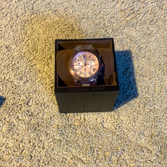 Brand new. Michael Kors Rose Gold Watch. Never been worn, tags still on.
